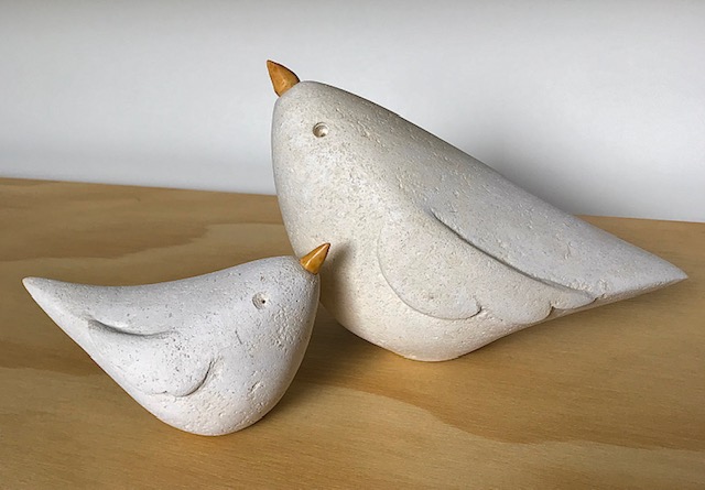 Limestone mother and baby bird sculpture with applewood beaks.