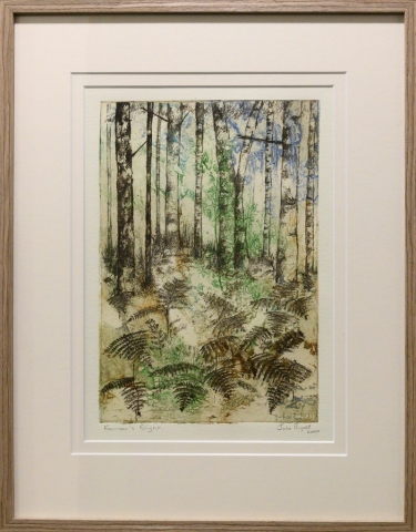 Framed artwork by Julie Bignell of bracken fern in the foreground with tall skinny tree trunks in the background