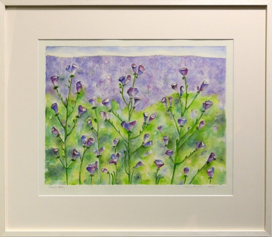 Framed artwork by Julie Bignell of purple flowers in the foreground with a green and purple background