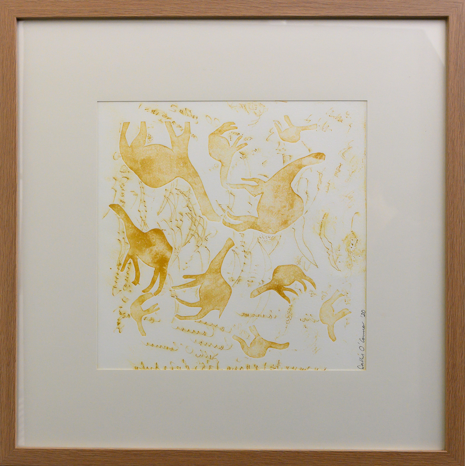 Framed artwork by Sally OConnor of simplistic yellow camels