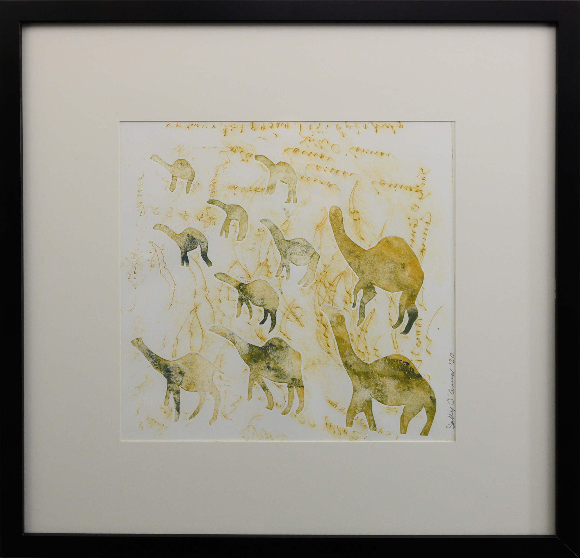 Framed artwork by Sally OConnor of simplistic yellow/green camels