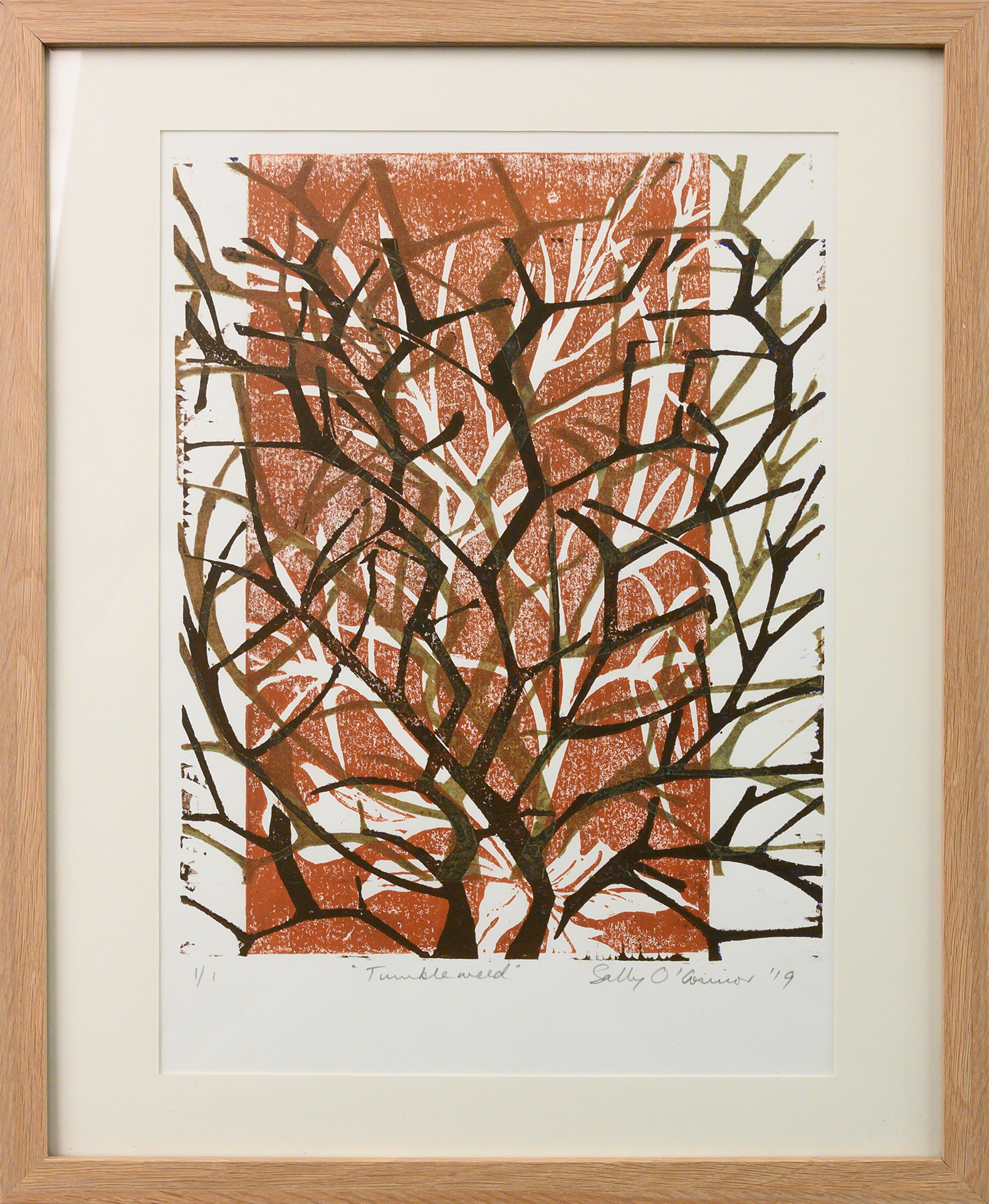 Framed artwork by Sally OConnor of layers of closeup tumbleweed branches in earthy tones