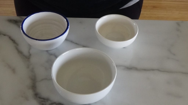 Ceramic bowls on countertop.